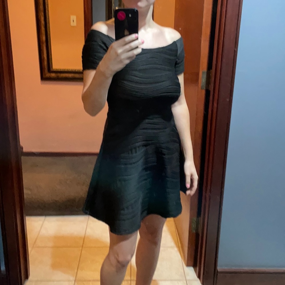 Black off the shoulder dress with detailing